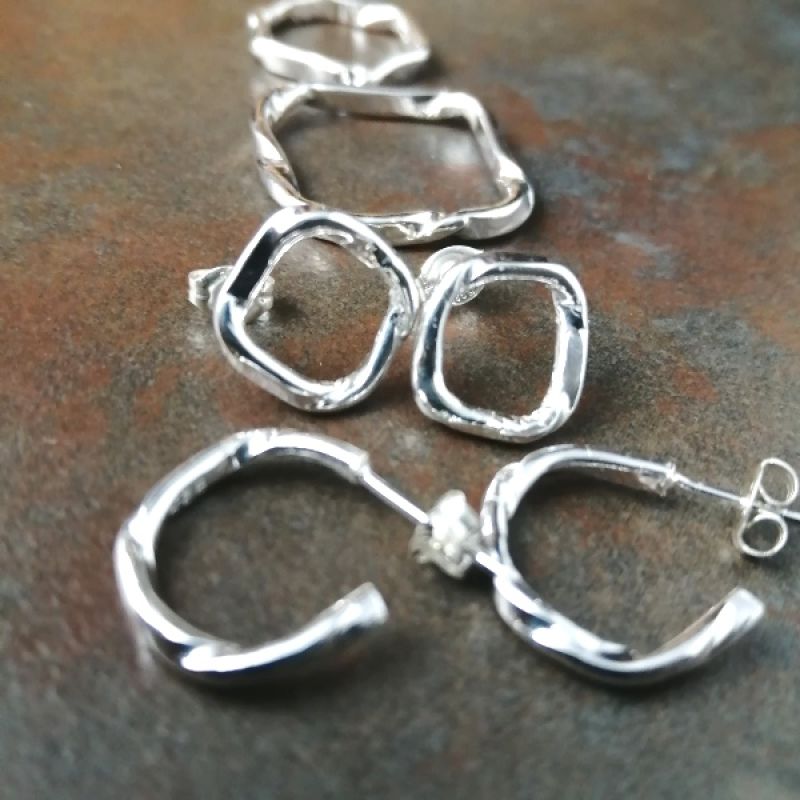 Handcrafted recycled sterling silver minimalist contemporary geometric shaped Flow rings, hoops and studs, stylish pieces of wearable art with attitude.